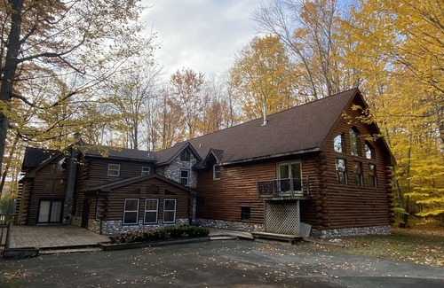Lake Leelanau House | Rustic Log Cabin Retreat across from Lake Leelanau