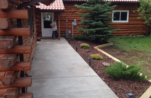 Grand Marais Cabin | Rustic log cabin with large loft 3 total bedrooms rustic log railings