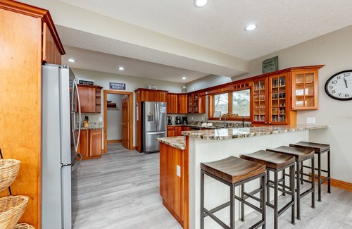 McHenry House | Rustic Luxury Lake Escape w/Indoor Pool & Dock