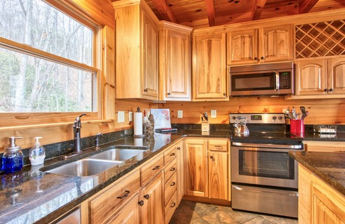 Lake Lure Cabin | Rustic mountain-view home with deck, fire pit, hot tub, fireplace, & game room