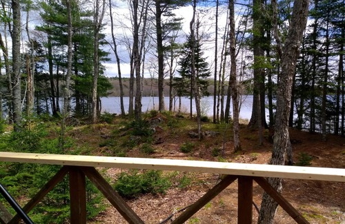Franklin Cabin | Rustic off grid experience lakefront with beautiful sunrise view of Schoodic Mtn