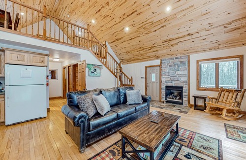 Mercer Cabin | Rustic resort cabin with lake views, deck & access to docks, canoe, paddle boats