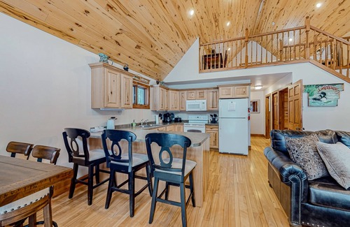 Mercer Cabin | Rustic resort cabin with lake views, deck & access to docks, canoe, paddle boats