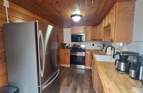 Maple View House | Rustic Riverside Charm and Exclusive Fishing Access!