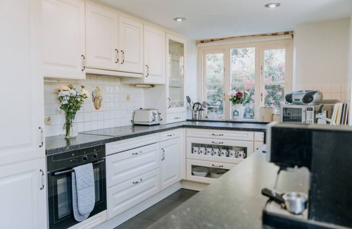 Narberth House | Rustic Rural Retreat with BBQ and Soft Play Room