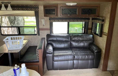 Saint Mary Of The Woods RV Rental | RV on a lake in a campground. Great for parties