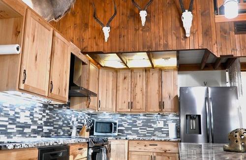 Fall River House | Safari-Theme Lodge w/Hot Tub at Fall River Lake for Family, Hunting or Fishing!