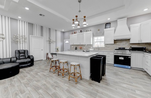 Killeen House | Safari themed 8 bedrooms 3 bath home with 3 - 4 dining areas & grand kitchen