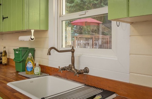 Guerneville Cabin | Salmon House is incredibly family-friendly! Hot tub! Games! Walk to River! Woof!