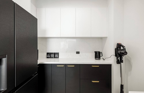 San Remo House | San Remo Luxe 1, large modern home with 180-degree bay views, outdoor spa.