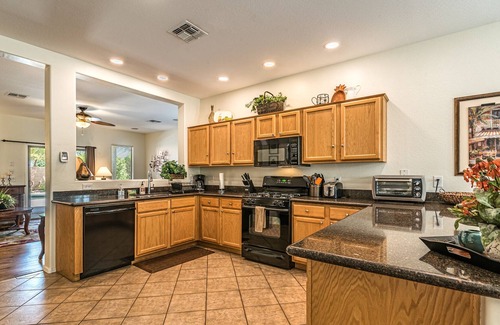 Pecan Creek House | San Tan Valley Backyard Paradise with Heated Pool, Putting Green, and Fire Pit