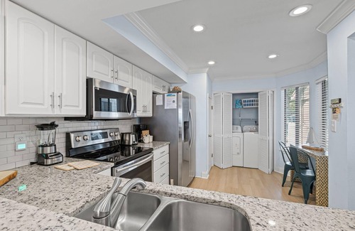 Sandestin House | Sandestin Starfish: Serene Bayfront Condo with Golf Cart, Workstation, and Stunning Views