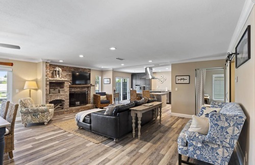 Palm Harbor House | Sandfiddler Pool Home | Canal View | Dock | Heated Pool | Close to Beach and Golfing | Free WIFI