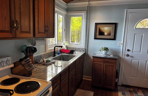 Mayfield Cottage | Sandy waterfront near Traverse City on High Lake Dock, kayak, firepit! Dog ok
