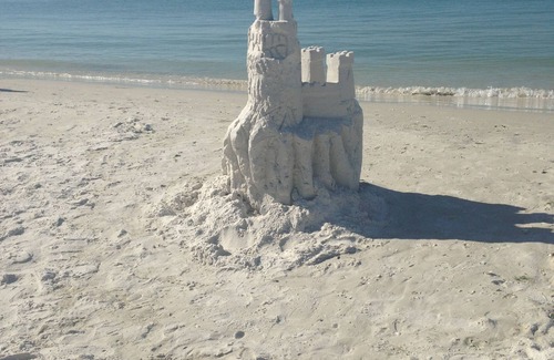 South Island Condo | Sandy, white beaches right outside your door! Relax and let the good times roll!