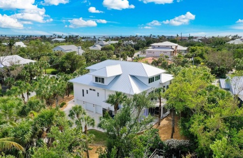 Shell Harbor House | Sanibel 6 bedroom Luxury Home with Pool,One Block from Beach,Pier and Canal View