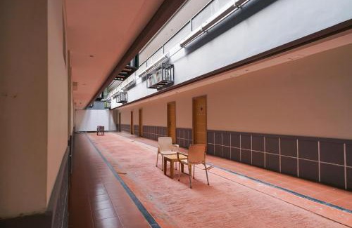 Jakarta Hotel | Sans Hotel Rumah Kita Daan Mogot by RedDoorz