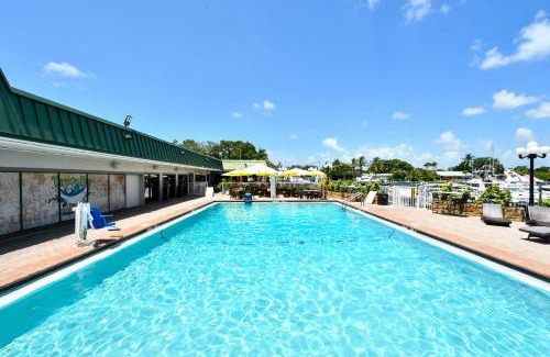 Trailer Estates Apartment | Sarasota Cay Club #612 - Heated Pool, Bunk Beds, Huge TV, Tiki Bar, More!