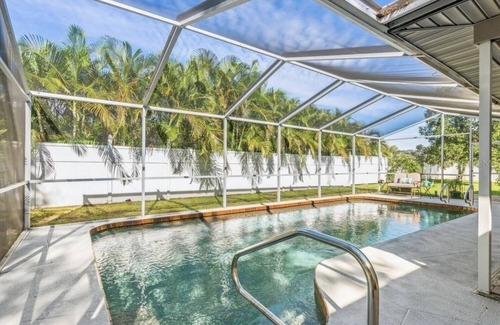 Pinecraft House | Sarasota's Family Friendly HEATED Pool Home Close to Siesta Key Beach