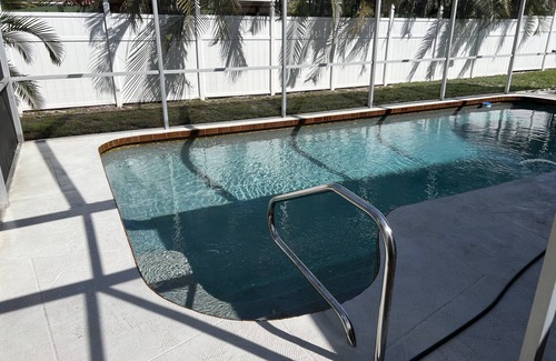 Pinecraft House | Sarasota's Family Friendly HEATED Pool Home Close to Siesta Key Beach