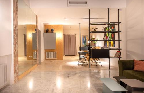 Castellammare Apartment | Sartoria Cavour - Modern Sicilian Elegance in a Former Tailor Shop
