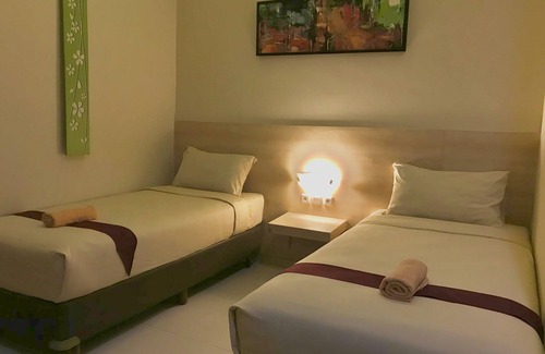 Sari Harjo Hotel | Savita Garden Inn
