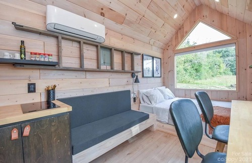 Salisbury Apartment | Scandinavian tiny home surrounded by nature with patio, solo fire pit, grill.