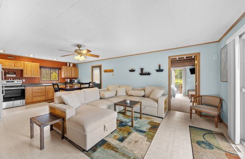 Nekoosa Cabin | Scenic riverfront cottage with boat landing and docks.