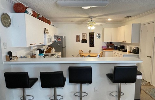 Lady Lake Villa | Score big in this hoops-themed retreat packed with college basketball pride!