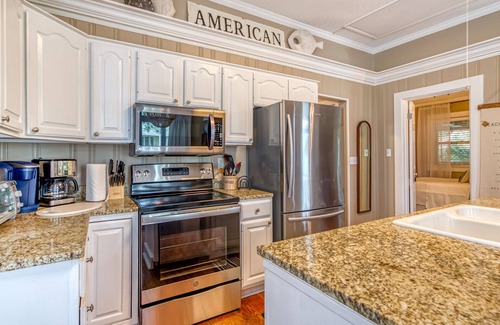 Tybee Island Cottage | Screened in Lounge Porch, Heated Pool Access