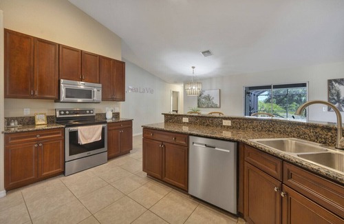 Port Charlotte Apartment | Screened Pool Pet Friendly Grill Near Beach