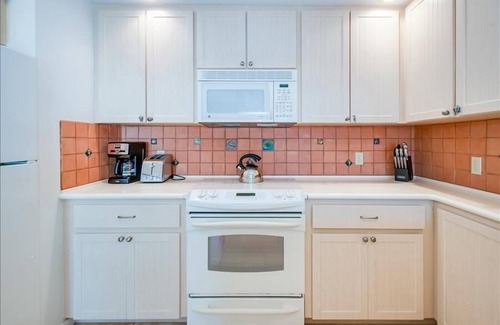 Downtown Boca Grande Historic District Condo | Sea Oats 336 by RedAwning