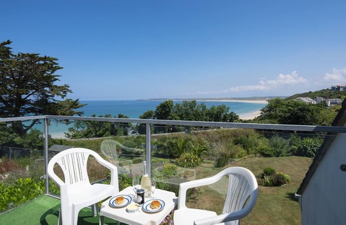 Carbis Bay Apartment | Sea view apartment with balcony and gardens. Private path to the beach.