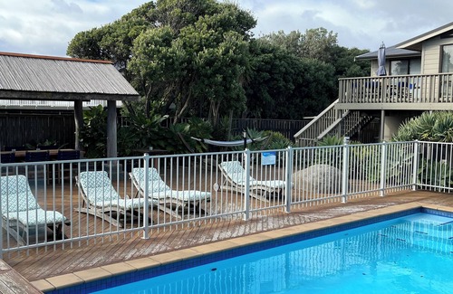 Waikanae House | SEABREEZE@Longshore: heated swimming pool, spa, tennis court, 2 minutes to beach