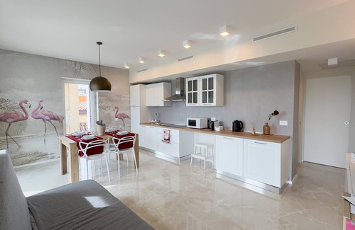 Chioggia Apartment | Seafront Modern Flamingo Suite by Ca-sa Check