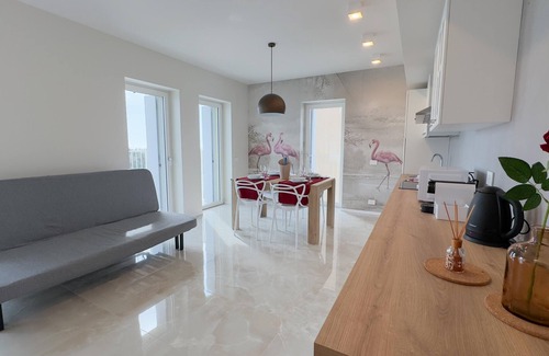 Chioggia Apartment | Seafront Modern Flamingo Suite by Ca-sa Check