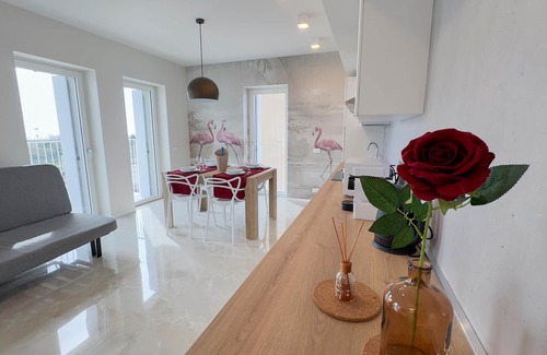 Chioggia Apartment | Seafront Modern Flamingo Suite by Ca-sa Check