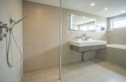 Westkapelle Hotel | Seaside Bliss with Outdoor Swimming Pool, Beach Loungers & Tennis Court Fun