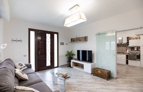 Torre del Lago Puccini House | Seaside villa sleeping up to 8 people with private garden and 2 parking spaces.