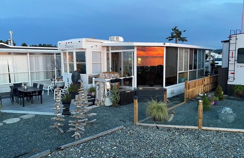 Regional District of Nanaimo House | Seaside Serenity. Oceanfront views of sunrise & sunset at this resort property.