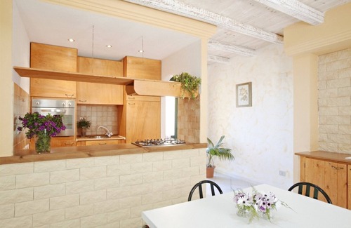 Chia Villa | Seaside villa with garden and panoramic mountain views.