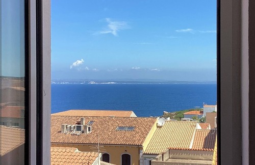 Santa Teresa di Gallura Apartment | Seaview cozy penthouse 300m walk to the beach, large terrace. Center Village.