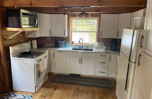 Hayward Cabin | Secluded cabin set back in the woods with dock access on beautiful Round Lake