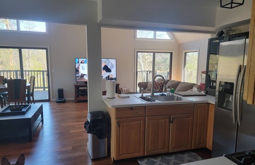 Harrison Ski Chalet | Secluded chalet in the woods overlooking a huge pond only 5 minutes to town.