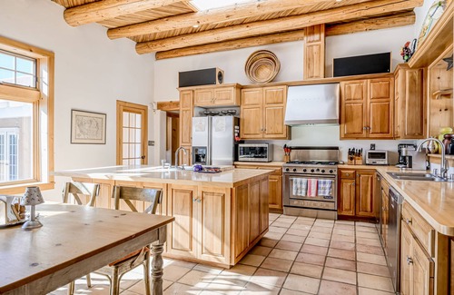 Valdez House | Secluded, dog-friendly adobe home with patio, kivas, & washer/dryer