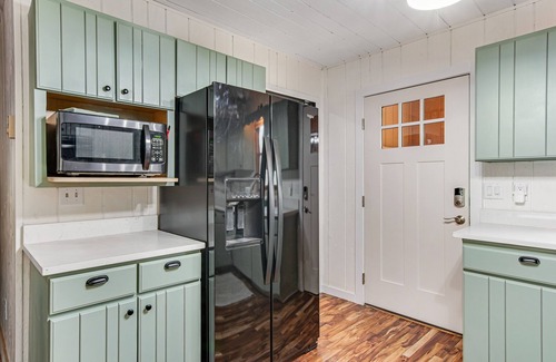 Oxford House | Secluded home near the lake with huge sunroom, firepit, gas grill, & private W/D