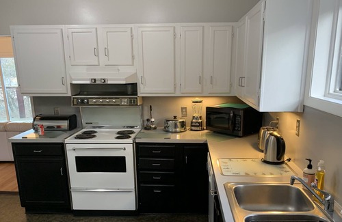 Crescent Hill House | Secluded Mid Century Home in Crescent Hill on a 1/2 acre in the city