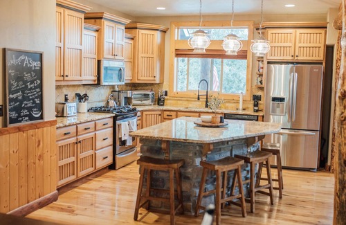 Duck Creek Village Cabin | Secluded Modern Cabin with Hot Tub