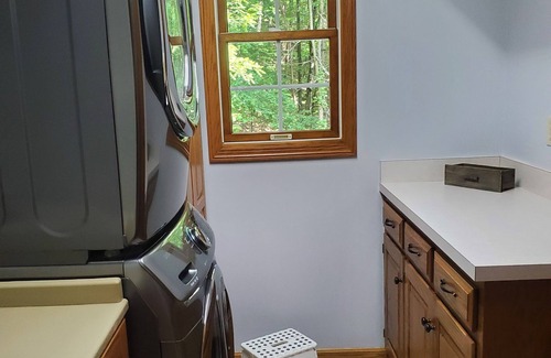 Killbuck House | Secluded peaceful family home! Large deck, patio, waterfalls, koi pond, hot tub!