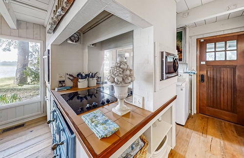 Fernandina Beach House | Secluded riverfront home with dock, firepit, grill, river views, patio, & AC